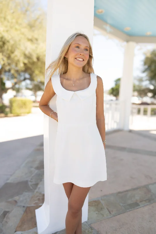 Mini dresses with criss - cross backs for a flirty look Summer White Mini Dress