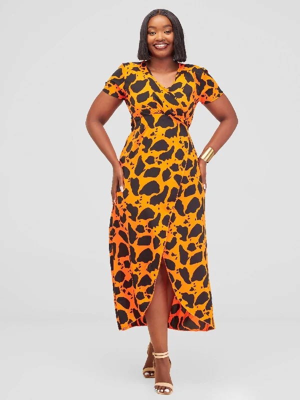 Midi dresses with fringe details for a fun and energetic style Distinct Wear Pili Dress - Orange / Black Print Midi dresses with fringe details for a fun and energetic style Distinct Wear Pili Dress - Orange / Black Print